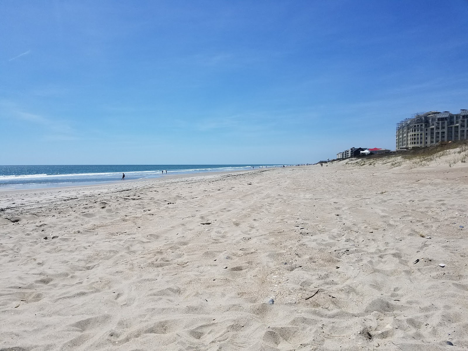 Fotografija Indian beach z svetel pesek površino