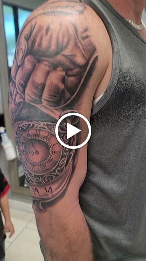 Explore ampersand tattoo ideas, creative tattoo ideas in Ocoee, available at Slaughterized Ink Tattoo and Piercing Studio