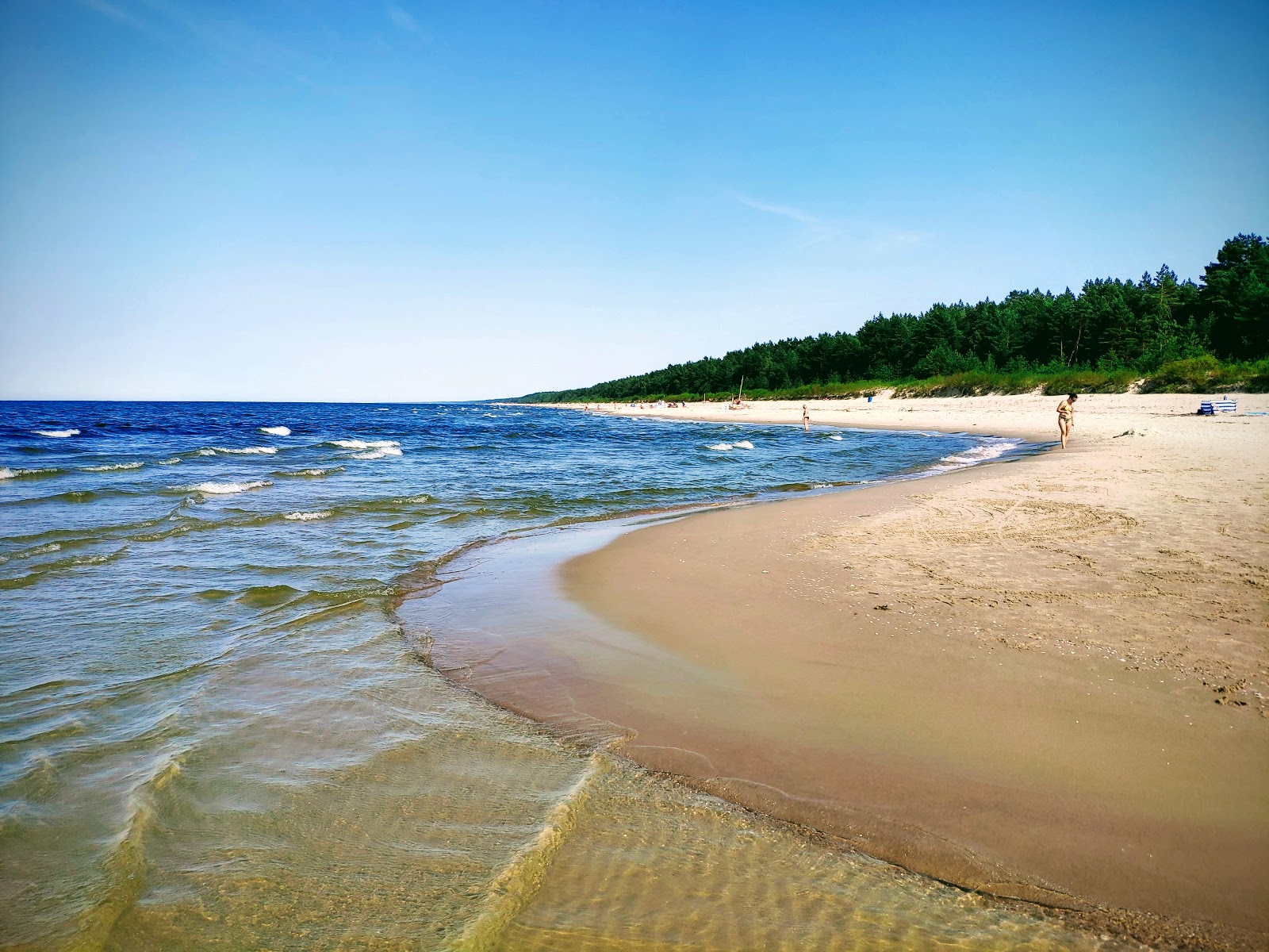 Foto van Jantar beach met gemiddeld niveau van netheid