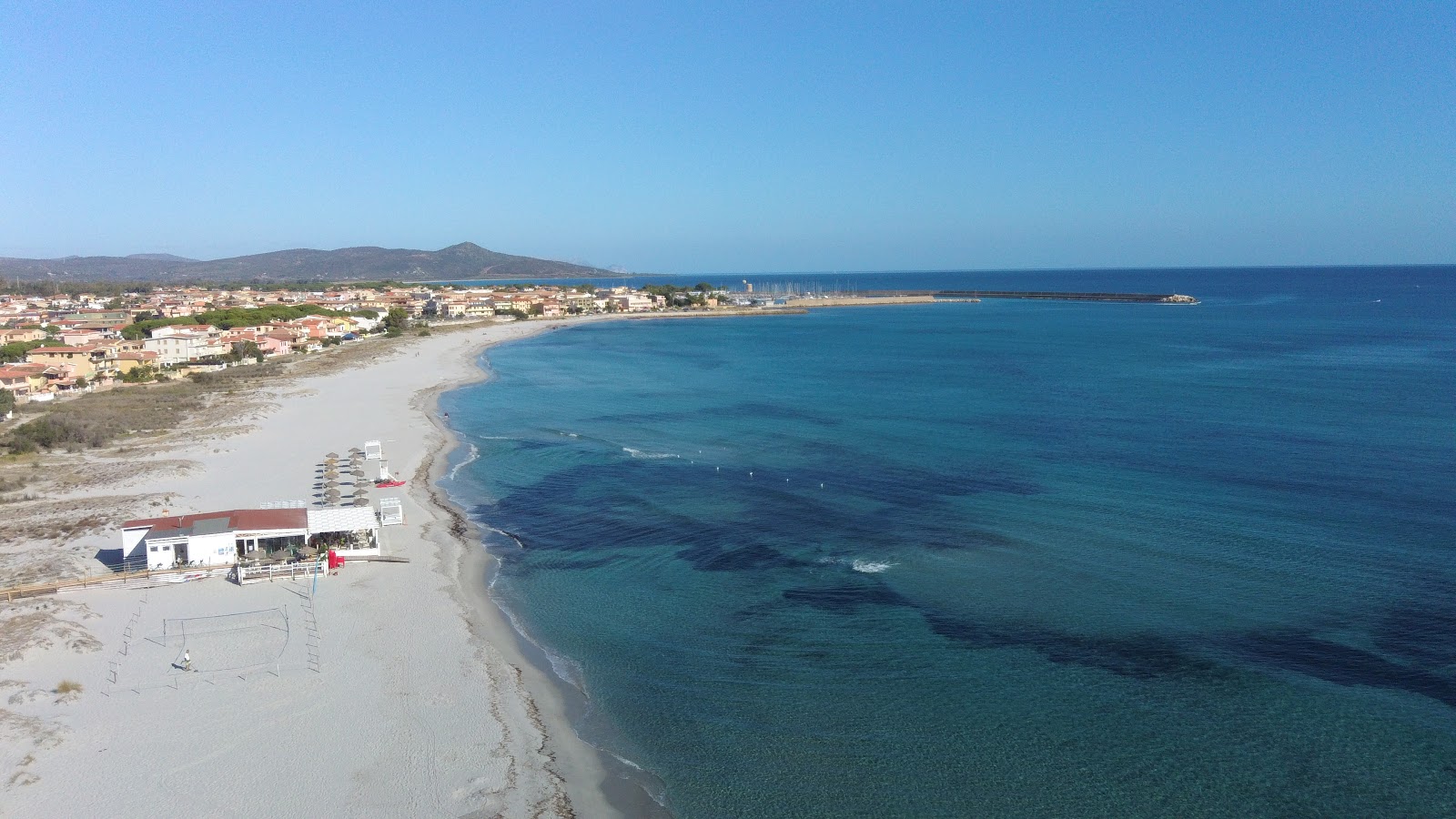 Zdjęcie Spiaggia La Caletta z powierzchnią turkusowa czysta woda
