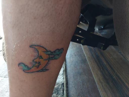 Explore bear tattoo ideas for guys, creative tattoo ideas in Clearwater, available at Moniques Body Art