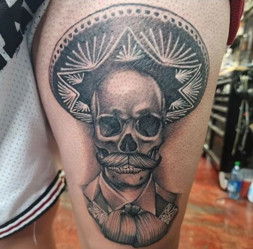 Explore tattoos ideas on back, creative tattoo ideas in Lakewood, available at Aces and Eights Tattoo