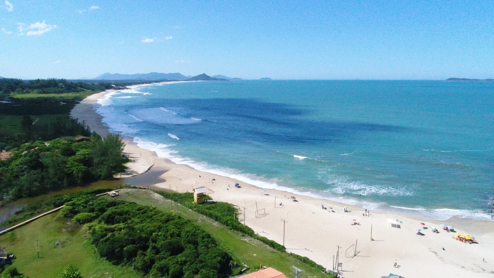 Foto av Praia da Gamboa med lång rak strand