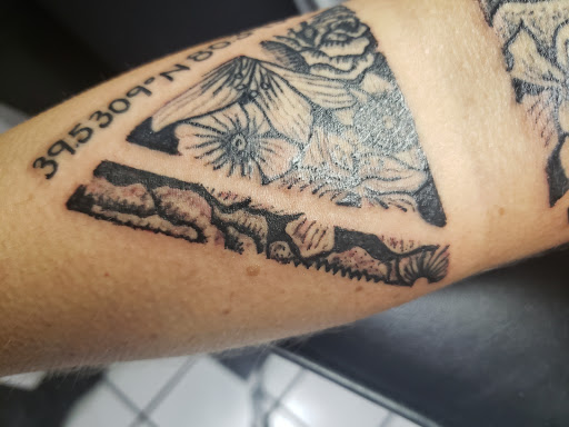 Explore traditional neck tattoo ideas, creative tattoo ideas in Erie, available at EliKingInk