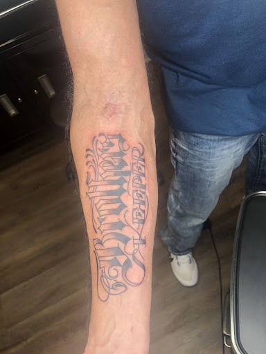 Find tattoo ideas armbands for your next unique tattoo in Crossville at Living Canvas Tattoo