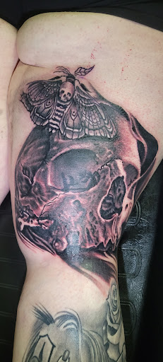 Find top sleeve tattoo ideas for your next unique tattoo in Angola at Hoodlum Ink