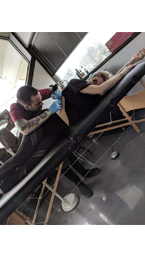 Explore lilac tattoo ideas, creative tattoo ideas in Tallmadge, available at Killjoy tattoo