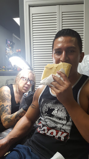 Explore wrap around arm tattoo ideas, creative tattoo ideas in Lake Mary, available at Balinese Tattoo USA