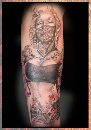 Explore tattoo on buttock ideas, creative tattoo ideas in Omaha, available at Eternal Tattoo & Body Piercing - Omaha