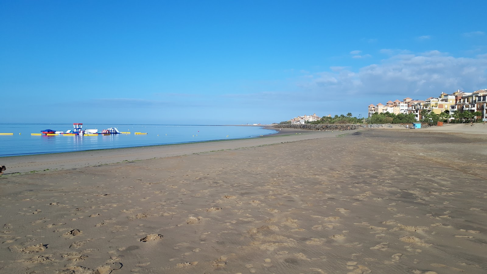 Photo de Playa de San Miguel avec l'eau bleu-vert de surface