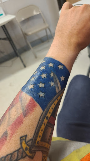 Explore miami dolphins tattoo ideas, creative tattoo ideas in Pearland, available at Black List Tattoo & Piercing Co.