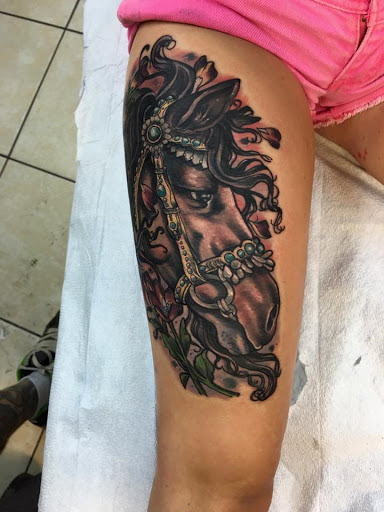 Explore tattoo on thigh ideas, creative tattoo ideas in Harrisonburg, available at Dreamland Tattoo