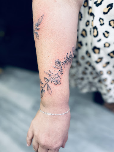 Explore tattoo ideas for mothers with sons, creative tattoo ideas in Holmen, available at Driftless Tattoo and Art LLC