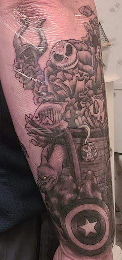 Explore marvel comic tattoo ideas, creative tattoo ideas in Kissimmee, available at Fallen Heroes Tattoo & Piercing (Florida)