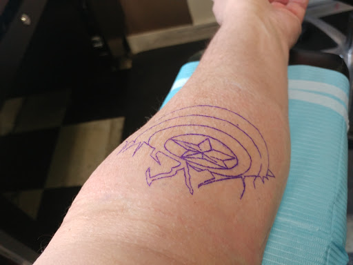 Explore 2 dog tattoo ideas, creative tattoo ideas in Pelham, available at Tattoo Fever
