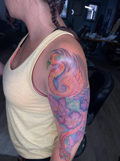 Explore female thigh tattoo ideas, creative tattoo ideas in Donora, available at Alchemy Arts Tattoo & Permanent Makeup Studio