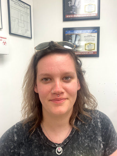 Explore neck tattoo ideas woman, creative tattoo ideas in Myrtle Beach, available at Professional Body Piercing by Jackie