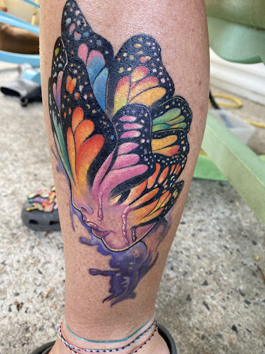 Explore lotus flower tattoo ideas, creative tattoo ideas in Shallotte, available at Ocean Isle Ink & Piercing
