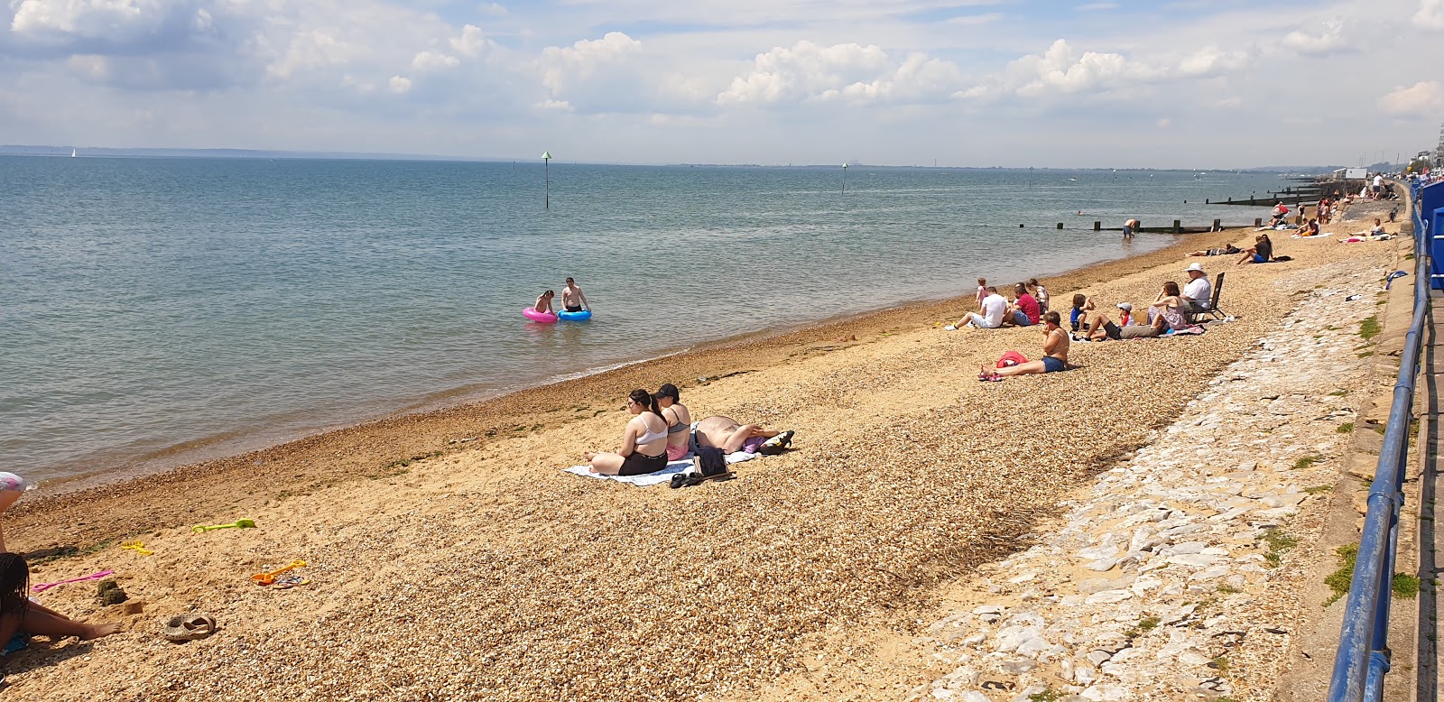 Photo of Westcliff beach with light sand &  pebble surface