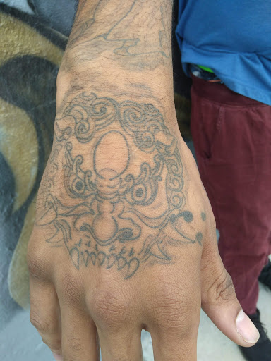 Explore birth month flower tattoo ideas, creative tattoo ideas in Overland Park, available at Inkslingers Tattoo Studio