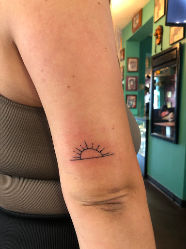 Explore christian cross tattoo ideas, creative tattoo ideas in San Diego, available at Sideshow Tattoo and Piercing