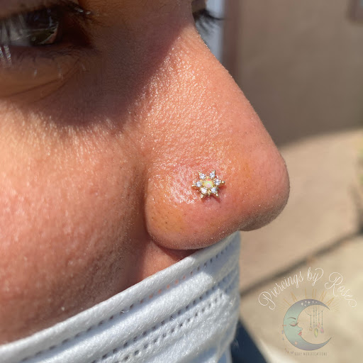 Explore female tattoo placement ideas, creative tattoo ideas in Visalia, available at La Luna Piercings and Fine Jewelry