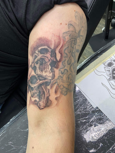 Find tattoos under the breast ideas for your next unique tattoo in El Paso at American Tattoo Society of Ft Bliss