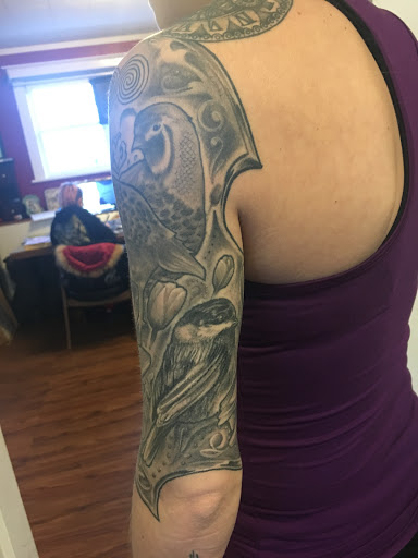 Explore hippie tattoo ideas, creative tattoo ideas in Milford, available at Golden Hammer Tattoo Studios