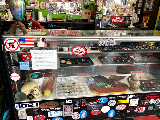 Explore little dragon tattoo ideas, creative tattoo ideas in Milwaukee, available at Atomic Tattoos