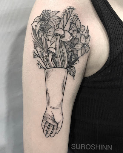 Explore dance tattoo ideas, creative tattoo ideas in New York, available at Red Baron Ink Tattoo and Piercing