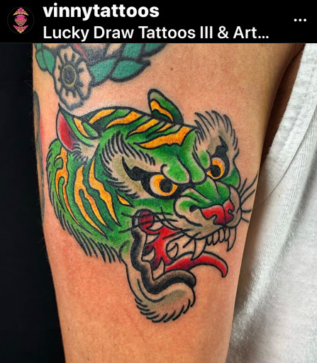 Explore orchid tattoo ideas, creative tattoo ideas in Marietta, available at Lucky Draw Tattoos III