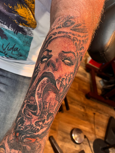 Explore tattoo sleeve ideas colour, creative tattoo ideas in Pikeville, available at The Carbon Canary Tattoo Studio