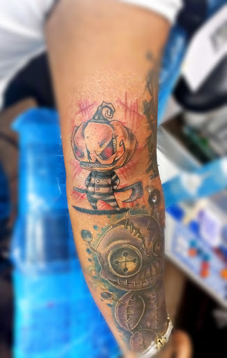 Explore disney tattoo sleeve ideas, creative tattoo ideas in Springfield, available at Red Tip Tattoos