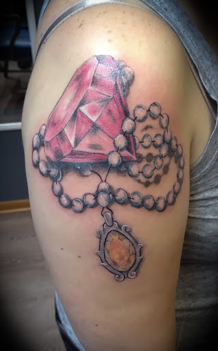 Find sun moon tattoo ideas for your next unique tattoo in Johnson City at Defiant Designs