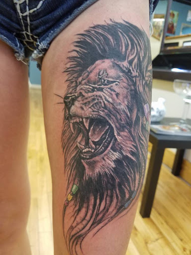 Explore dripping tattoo ideas, creative tattoo ideas in Rochester, available at Sacred Heart Studios