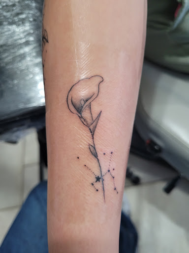 Explore tattoo ideas sports, creative tattoo ideas in Espanola, available at Daydreamer Tattoo
