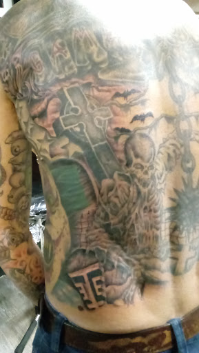 Explore tombstone tattoo ideas, creative tattoo ideas in Myrtle Beach, available at Elite Ink Tattoos of Myrtle Beach