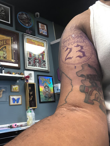 Explore tattoo ideas on ribs, creative tattoo ideas in Arlington, available at Urbans Tattoo & Piercing Studio