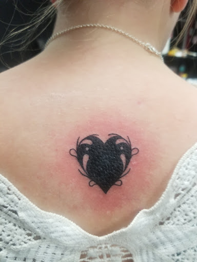 Explore orca whale tattoo ideas, creative tattoo ideas in Port Charlotte, available at Sacred Rites Tattoo