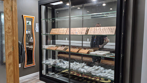 Find best travel tattoo ideas for your next unique tattoo in Springfield at Newage Tattoos and Body Piercings