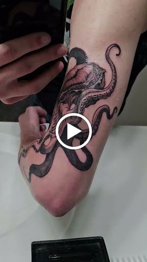Explore mens foot tattoo ideas, creative tattoo ideas in Ithaca, available at Kingdom Tattoo Company