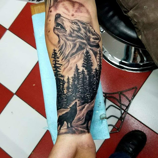 Explore halloween tattoo sleeve ideas, creative tattoo ideas in Vinton, available at Cherry Bomb Tattoo and piercing