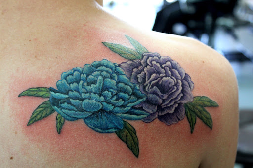 Explore rengoku tattoo ideas, creative tattoo ideas in Fort Myers, available at Tiger Lotus Tattoo and Piercing