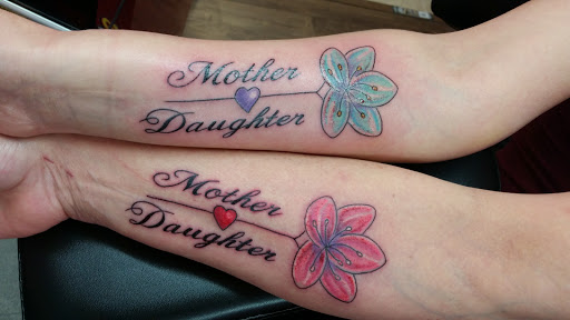 Explore word family tattoo ideas, creative tattoo ideas in Rapid City, available at Torch Lake Ink