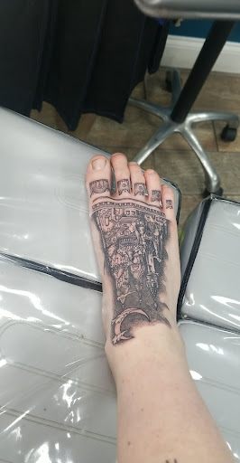 Explore tiny ankle tattoo ideas, creative tattoo ideas in Buford, available at Wild Tribe Tattoos and Piercings