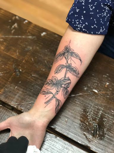 Explore filigree tattoo ideas, creative tattoo ideas in Sauk City, available at The Madison Tattoo Company