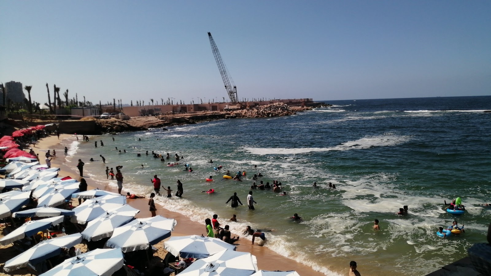 Foto von July 26 Public Beach mit beiger sand Oberfläche