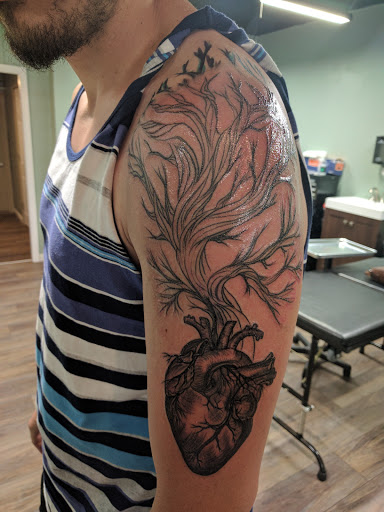 Explore music tattoos ideas, creative tattoo ideas in Cincinnati, available at Luminous Fine Jewelry and Piercing