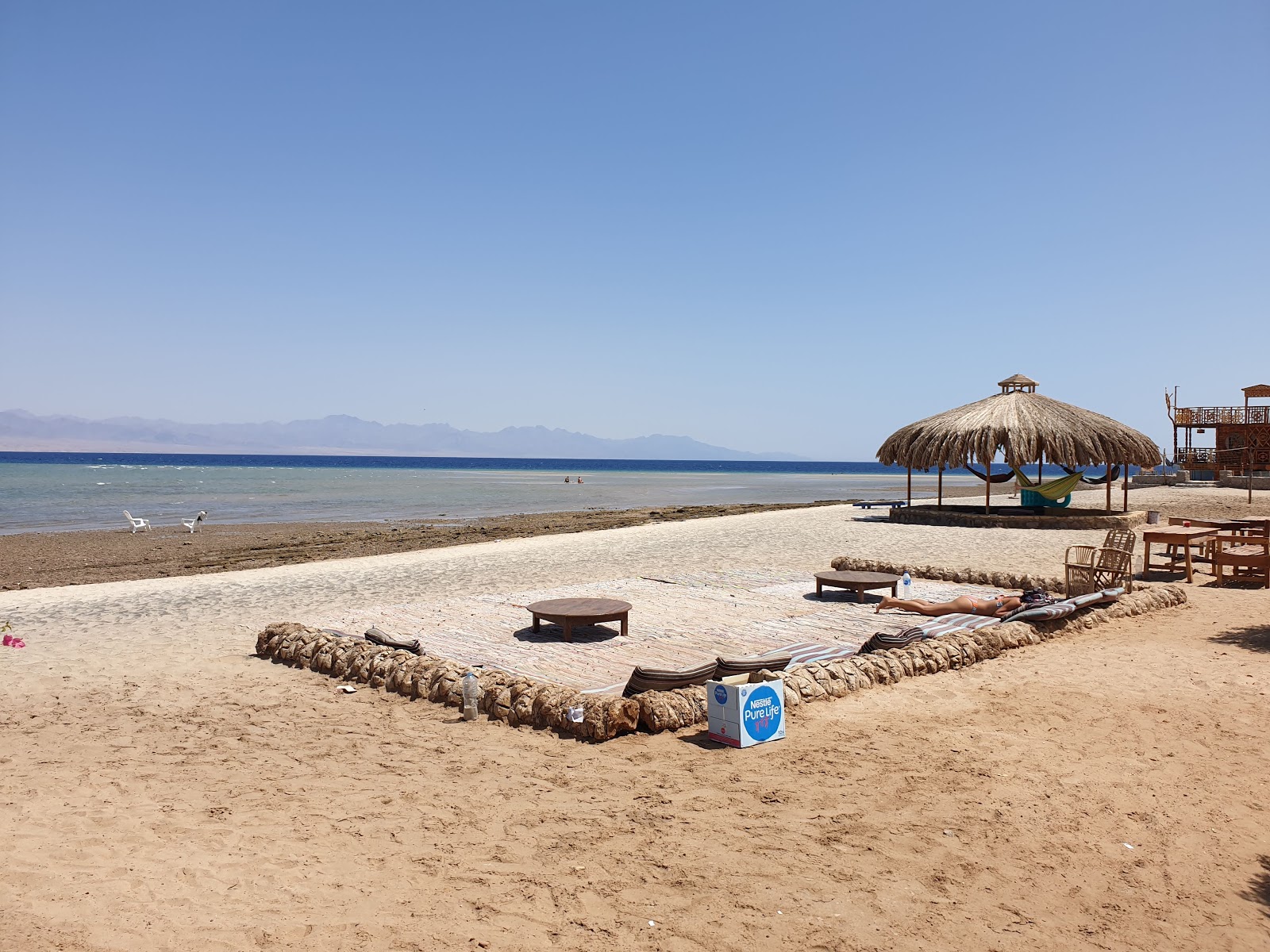 Foto av Dana beach med turkosa vatten yta