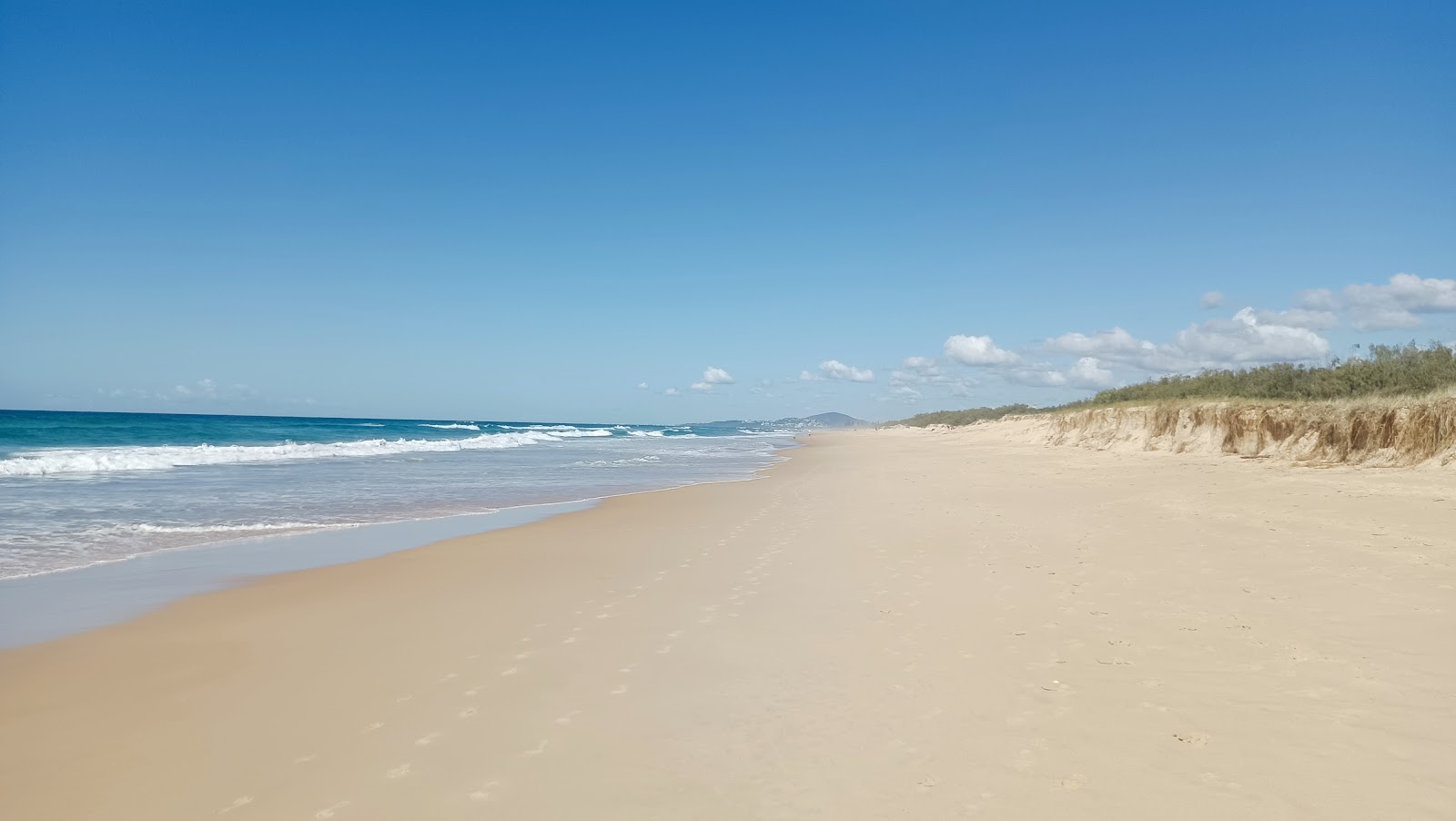 Photo de Marcus Beach avec sable fin et lumineux de surface